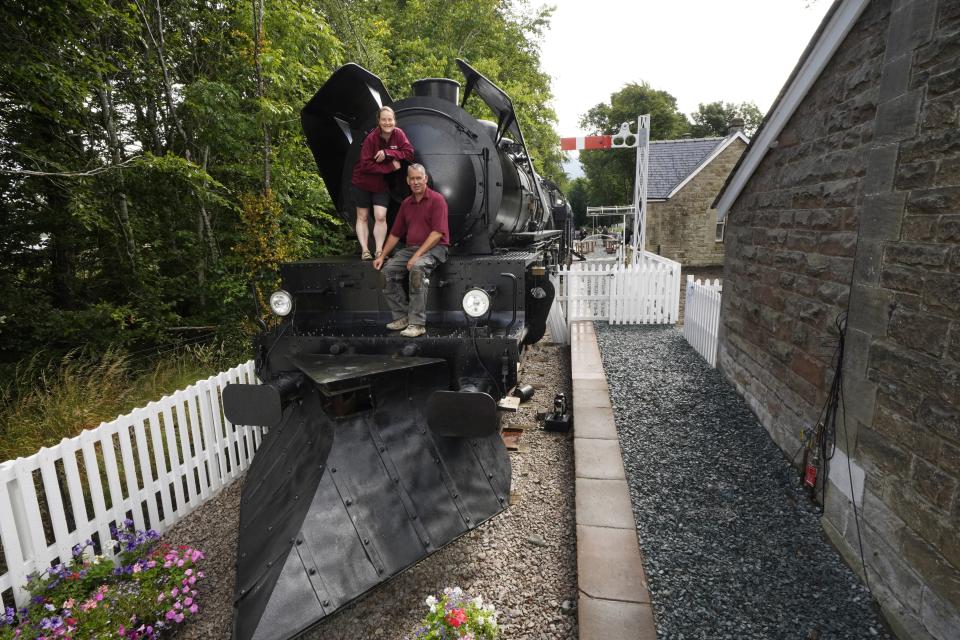 Simon and Diana Parums with their steam train (Owen Humphreys/PA) (PA Wire)