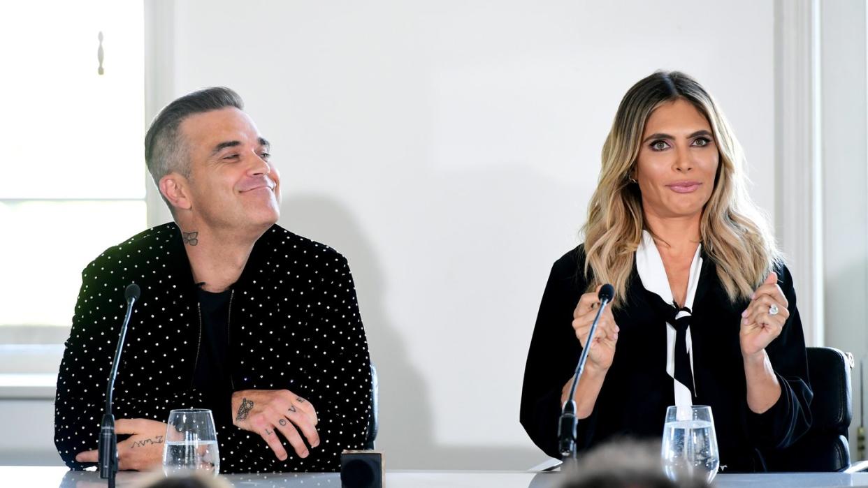 Robbie Williams bringt seine Frau Ayda Field noch immer zum Lachen. Foto: Ian West/PA Wire