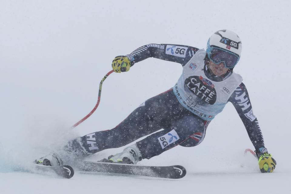 Norway's Ragnhild Mowinckel speeds down the course during an alpine ski, women's World Cup downhill race in Crans Montana, Switzerland, Sunday, Feb. 26, 2023. (AP Photo/Alessandro Trovati)