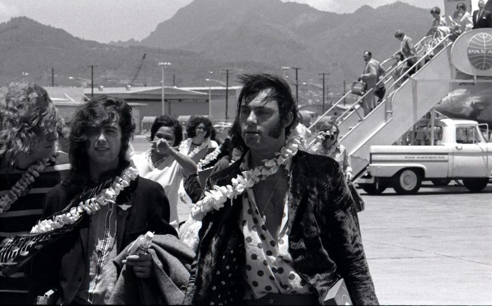 Richard Cole (right) arriving at Honolulu Airport, Hawaii in 1969 with (from left) Robert Plant and Jimmy Page - Robert Knight Archive/Redferns 