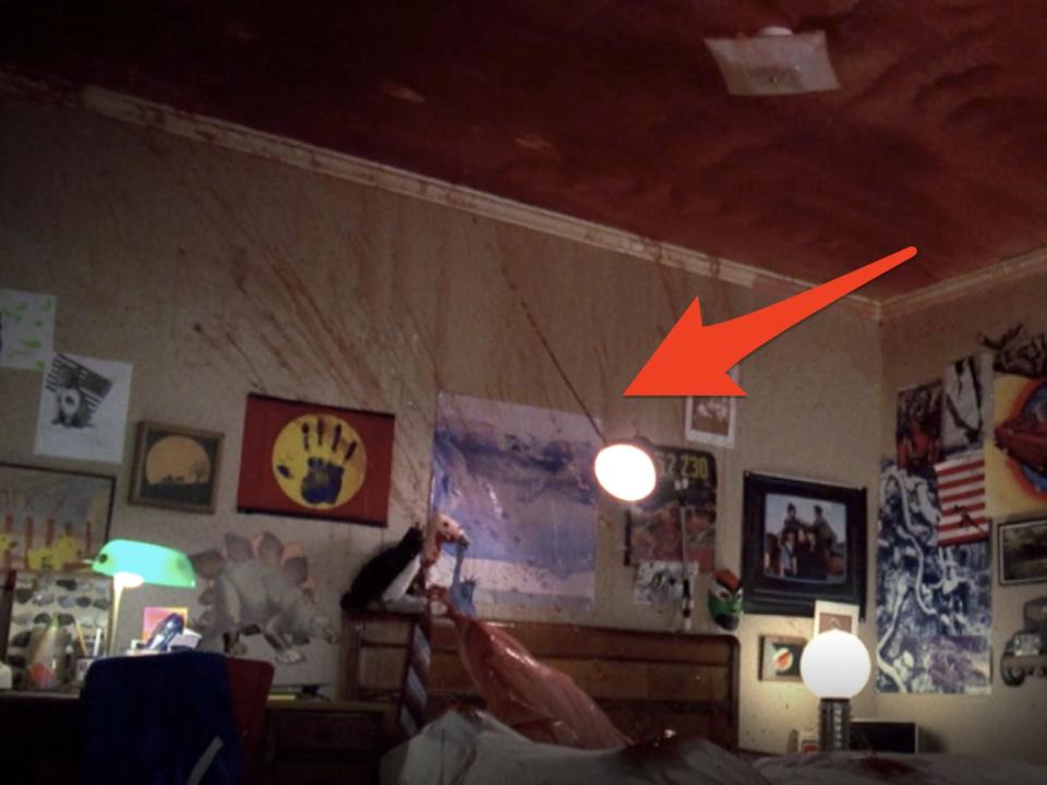 arrow pointing at blood splatter in nightmare on elm street scene