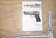 This July 1, 2012, photo released by the U.S. Army Criminal Investigation Command on Feb. 26, 2021, shows an instruction manual for a Beretta 9mm handgun at an Army storage yard in Kabul, Afghanistan. Army investigators determined that 65 handguns had been stolen from a cargo container. The theft went undetected until empty pistol boxes were discovered on the compound and a full inventory was taken. (U.S. Army Criminal Investigation Command via AP)