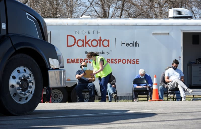 FILE PHOTO: Manitoba-based truckers transporting goods to and from the U.S. get vaccinated against coronavirus disease (COVID-19), North Dakota