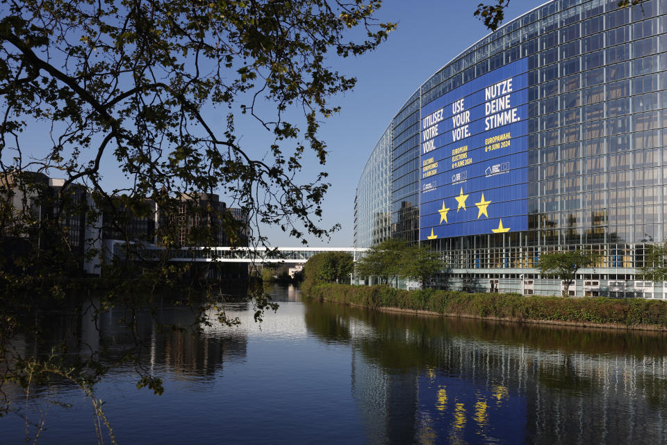 A giant canvas promoting the European elections is seen on the European Parliament Thursday, April 11, 2024 in Strasbourg, eastern France. The European Elections will take place from June 6 to June 9 2024. (AP Photo/Jean-Francois Badias)