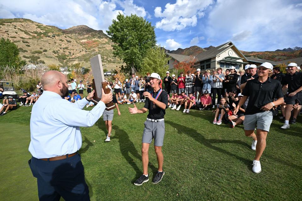 Corner Canyon receives their first place trophy in 6A Golf at Old Mill Golf Course in Holladay on Tuesday, Oct. 10, 2023. | Scott G Winterton, Deseret News