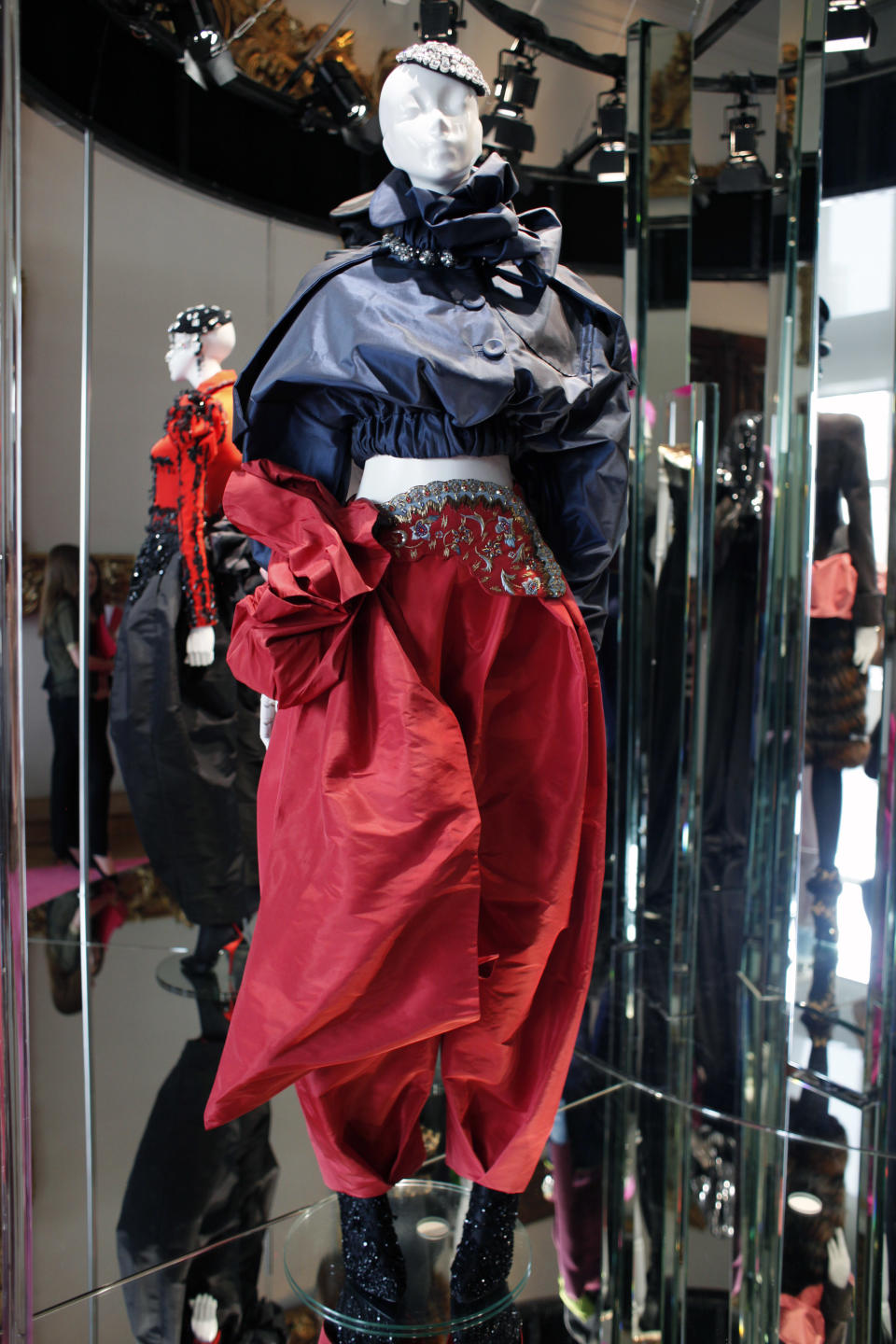 Mannequins wear creations by French designer Christian Lacroix for Schiaparelli's fashion collection presented in Paris, Monday, July 1, 2013. (AP Photo/Thibault Camus)