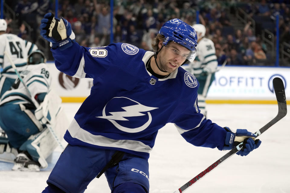 Tampa Bay Lightning left wing Brandon Hagel (38) celebrates his goal against the San Jose Sharks during the second period of an NHL hockey game Thursday, Oct. 26, 2023, in Tampa, Fla. (AP Photo/Chris O'Meara)