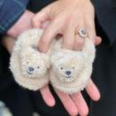 <p>In an adorable announcement in September 2020, Eugenie and Jack posted a closeup photo holding baby bear slippers after Buckingham Palace shared the <a href="https://people.com/royals/princess-eugenie-pregnant-first-child-jack-brooksbank/" rel="nofollow noopener" target="_blank" data-ylk="slk:happy news;elm:context_link;itc:0;sec:content-canvas" class="link ">happy news</a> they were expecting their first child.</p> <p>"Jack and I are so excited for early 2021....👶🏻," Eugenie captioned the snap, her <a href="https://people.com/royals/royal-proposals-meghan-markle-kate-middleton-queen-elizabeth-camilla-engagement-rings/" rel="nofollow noopener" target="_blank" data-ylk="slk:dazzling pink sapphire engagement ring;elm:context_link;itc:0;sec:content-canvas" class="link ">dazzling pink sapphire engagement ring</a> on display.</p>