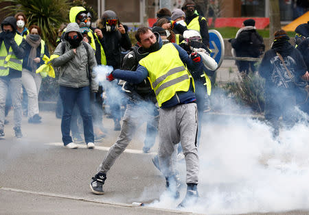 A protester wearing a yellow vest reacts during a demonstration of the "yellow vests" movement in Nantes, France, January 5, 2019. REUTERS/Stephane Mahe