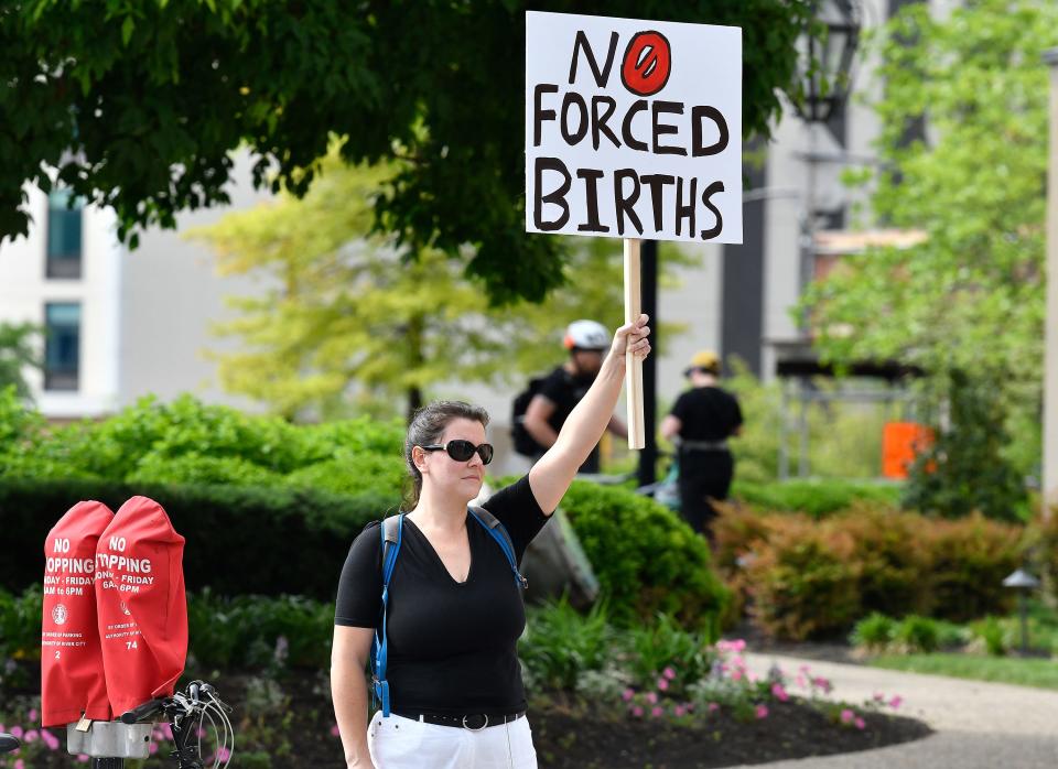 An abortion rights supporter holds up a sign during an abortion rights rally outside the Louisville Metro Hall, Wednesday, May. 4, 2022 in Louisville Ky.