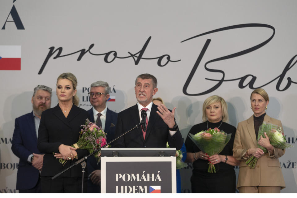 Presidential candidate and former Czech Republic's Prime Minister Andrej Babis, center, talks to members of the media after he conceded defeat at the presidential elections runoff, flanked by members of his election team in Prague, Czech Republic, Saturday, Jan. 28, 2023. Retired army General Petr Pavel defeated populist billionaire Andrej Babis in a runoff vote on Saturday to become the new Czech president. Pavel, 61, will succeed controversy-courting Milos Zeman in the largely ceremonial but prestigious post. (AP Photo/Marko Drobnjakovic)