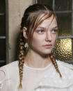 <p>Plaits might not be anything new but this year it's all about leaving things loosey goosey. </p><p>'The fact that they are soft and slightly undone gives them an element of modern romance,' says Adam Reed, 'Not every hair is in place and it's not over clean and over tidy. The braid itself is the dominant feature of all of these looks.<span>'</span></p><p><span>How to do it at home?</span></p><p><span>'Keep it soft with a bit of movement so it looks deliberately like you've done it yourself', says Adam, 'It's a good idea to use a hair oil to prep the hair so it looks healthy, glossy and shiny.'</span></p><p><span><strong>ELLE Loves...</strong><a rel="nofollow noopener" href="https://www.cultbeauty.co.uk/ouai-haircare-hair-oil.html?" target="_blank" data-ylk="slk:Ouai Hair Oil, £24;elm:context_link;itc:0;sec:content-canvas" class="link ">Ouai Hair Oil, £24</a></span></p>