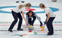 Curling - Pyeongchang 2018 Winter Olympics - Women's Round Robin - Britain v Canada - Gangneung Curling Center - Gangneung, South Korea - February 21, 2018 - Skip Eve Muirhead of Britain delivers a stone. REUTERS/Phil Noble