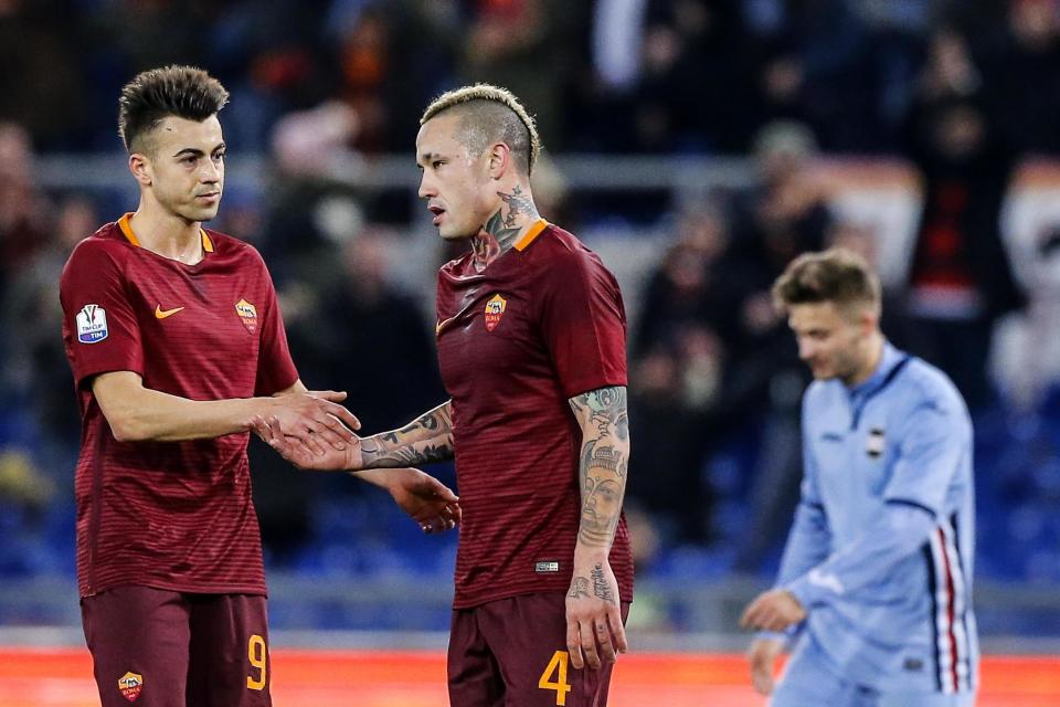 Roma's Radja Nainggolan, right, celebrates with his teammate Stephan El Shaarawy after scoring during an Italian Cup, round of 16, soccer match between Roma and Sampdoria, at Rome's Olympic stadium, Thursday, Jan. 19, 2017. (Angelo Carconi/ANSA via AP)