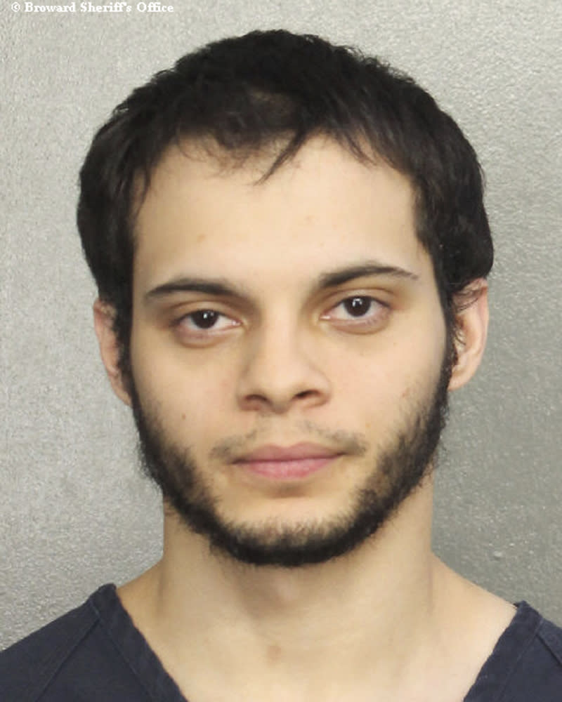 FILE- This file booking photo provided by the Broward Sheriff's Office shows suspect Esteban Santiago in Fort Lauderdale, Fla. Santiago, the Iraq war veteran accused of fatally shooting multiple people and wounding several others at a crowded Florida airport baggage claim, is due for his first court appearance Monday, Jan. 9, 2017. (Broward Sheriff's Office via AP)