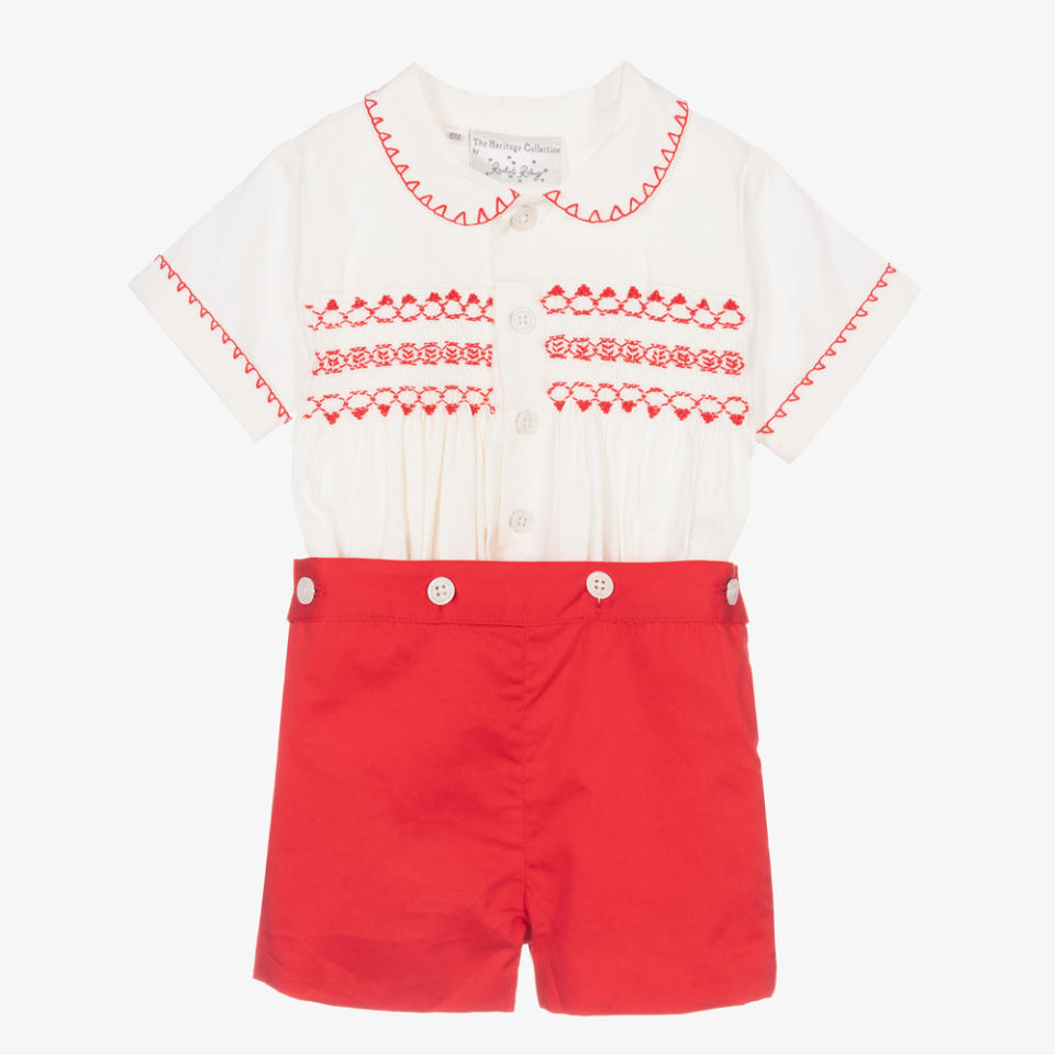 <p><a href="https://go.redirectingat.com?id=74968X1596630&url=https%3A%2F%2Fwww.childrensalon.com%2Frachel-riley-red-smocked-buster-suit-187375.html&sref=https%3A%2F%2Fwww.townandcountrymag.com%2Fstyle%2Ffashion-trends%2Fg40300677%2Froyal-approved-childrenswear-brands%2F" rel="nofollow noopener" target="_blank" data-ylk="slk:Shop Now;elm:context_link;itc:0;sec:content-canvas" class="link ">Shop Now</a></p><p>Red Smocked Buster Suit</p><p>$105.00</p><p>childrensalon.com</p><span class="copyright">Product Shot Image</span>