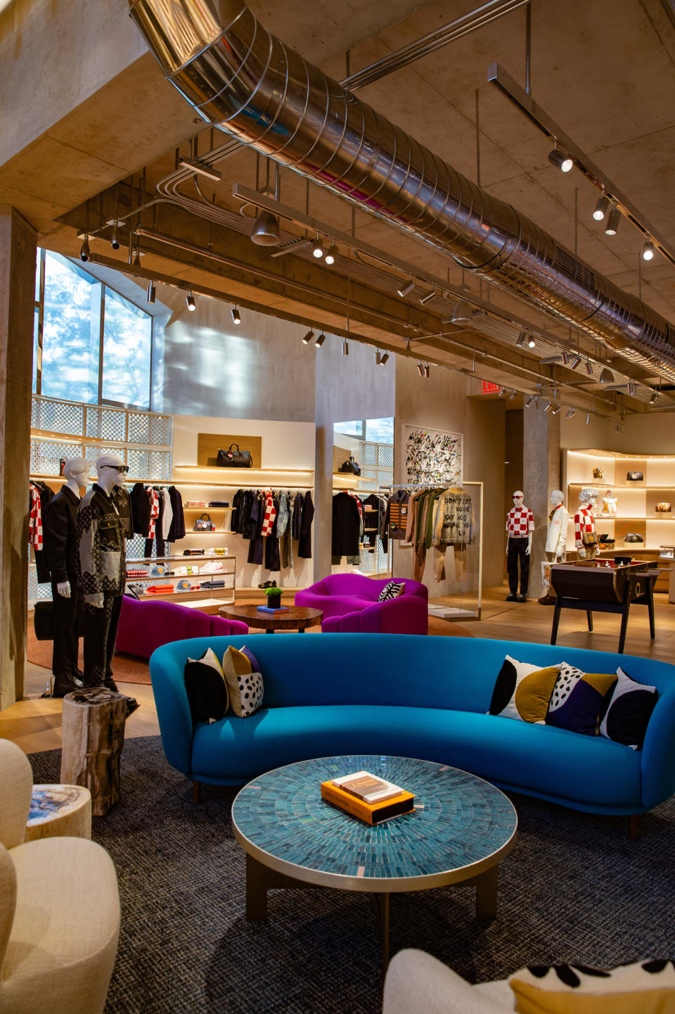 A seating area in the store and the fall collection on sale. - Credit: Lexie Moreland for WWD