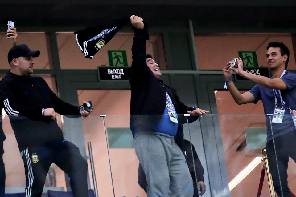 <p>Former Argentina player Diego Maradona swings a shirt around his head before the 2018 FIFA World Cup Russia group D match between Argentina and Croatia at Nizhny Novgorod Stadium on June 21, 2018 in Nizhny Novgorod, Russia. (Photo by Chris Brunskill/Fantasista/Getty Images) </p>