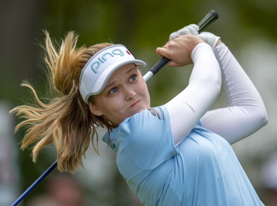 Brooke Henderson watches her tee shot on the first hole during the third round of the CP Women's Open in Aurora, Ontario in Aurora, Ontario, Saturday, Aug. 24, 2019. (Frank Gunn/The Canadian Press via AP)