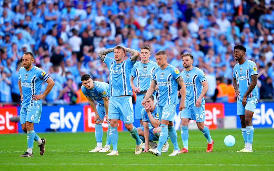 Coventry City players appear dejected after losing the penalty shoot-out - PA/Zac Goodwin