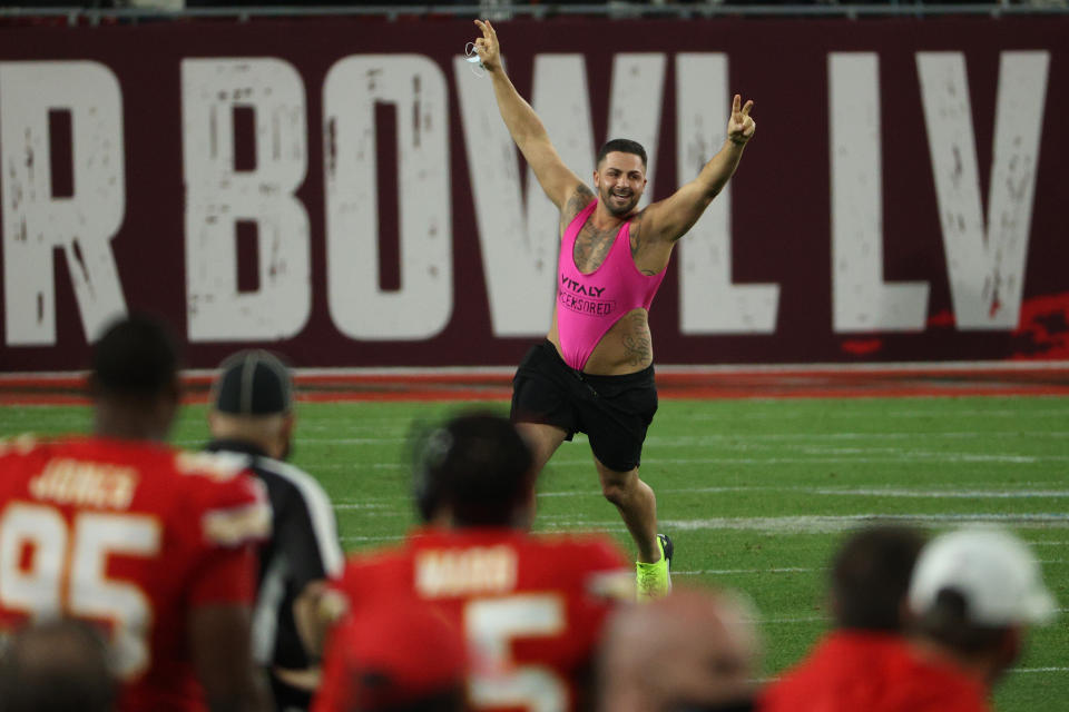 A man in a hot pink body thong caused a brief play suspension in the fourth quarter. (Photo: Patrick Smith via Getty Images)