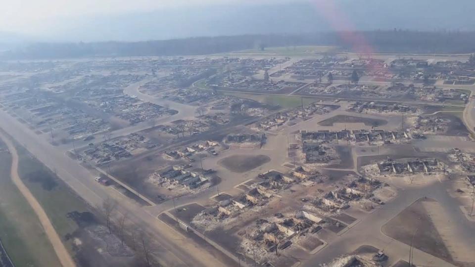 Buildings destroyed by a wildfire in Fort McMurray, Alta., are shown in this May 6, 2016, handout still from video. THE CANADIAN PRESS/HO