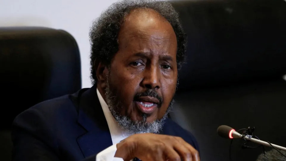 Somalia's President Hassan Sheikh Mohamud speaking in front of a microphone