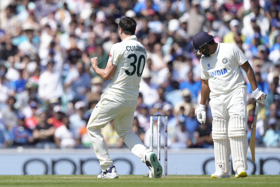 Australia's Pat Cummins celebrates taking the wicket of India's Rohit Sharma lbw on the second day of the ICC World Test Championship Final between India and Australia at The Oval cricket ground in London, Thursday, June 8, 2023. (AP Photo/Kirsty Wigglesworth)