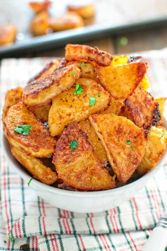 <p>Cooktoria</p><p>These tasty parmesan-crusted potatoes are so addictive, that you won't be able to stop eating until you finish them all!</p><p><strong>Get the recipe: <a href="https://cooktoria.com/parmesan-crusted-potatoes/" rel="nofollow noopener" target="_blank" data-ylk="slk:Parmesan-Crusted Potatoes;elm:context_link;itc:0;sec:content-canvas" class="link ">Parmesan-Crusted Potatoes</a></strong></p>