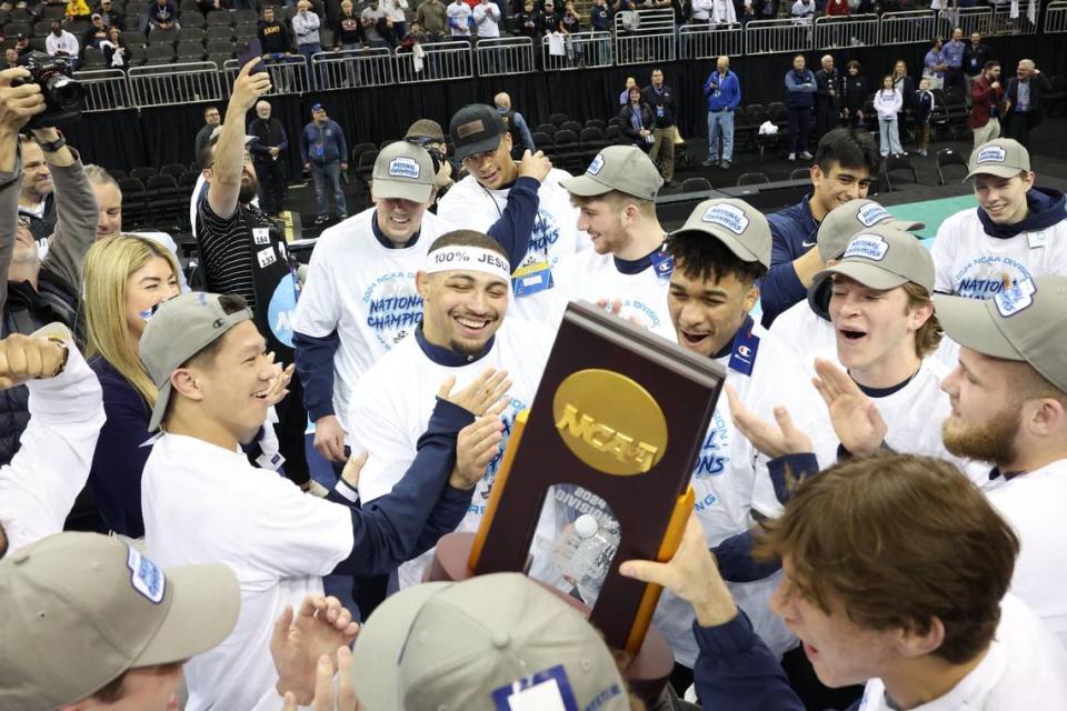 The Penn State Nittany Lions celebrate Saturday night after winning the NCAA Wrestling Title at the T-Mobile Center in Kansas City, Mo. Four Nittany Lions also earned national titles in their respective weight classes.