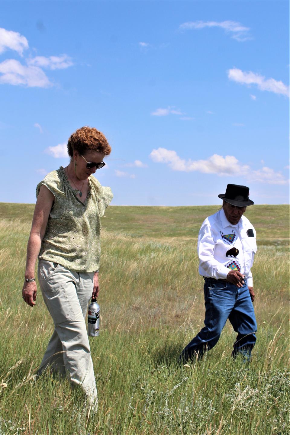 BLM Director Tracy Stone-Manning (left) walks the short grass prairie of the Fort Belknap Indian Reservation with tribal elder Donovan Archambeau.