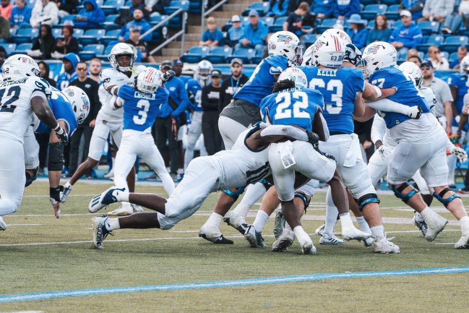 FIU’s defense stops a run during Saturday’s 40-6 loss to Middle Tennessee at Murfreesboro, Tenn. Courtesy of FIU Sports Information