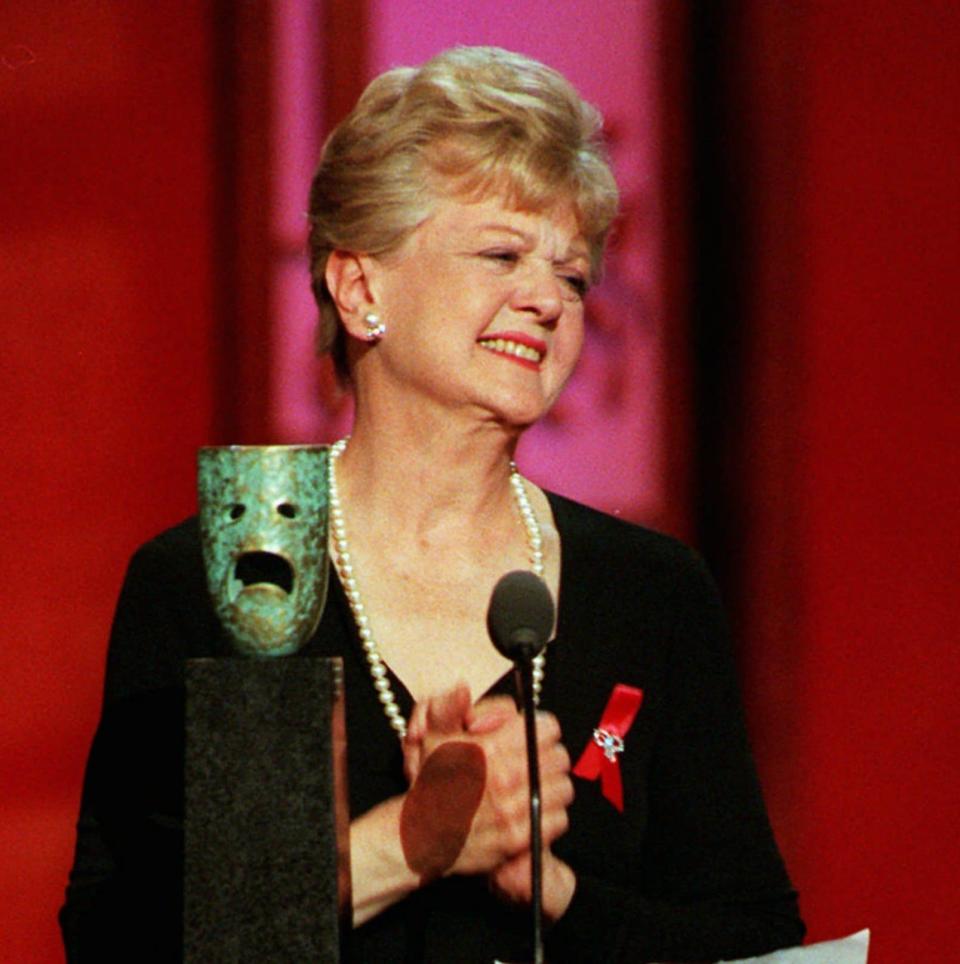 Actress Angela Lansbury reacts to the standing ovation by her peers after she was honored with a SAG lifetime achievment award during the 3rd annual Screen Actors Guild Awards in Los Angeles Saturday, Feb. 22, 1997 - KEVORK DJANSEZIAN 