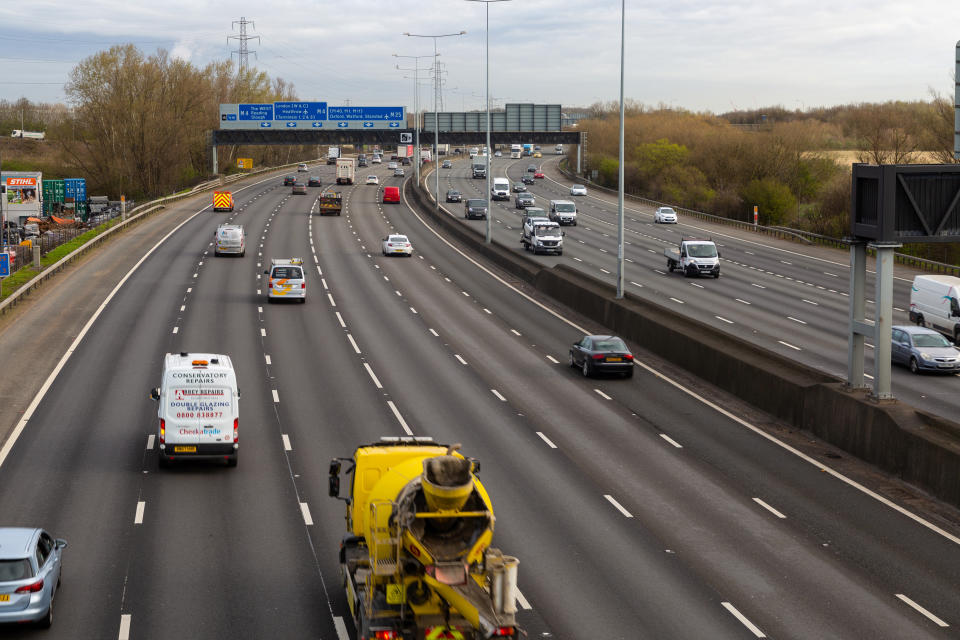 Usually bumper-to-bumper and crawling at a snail's pace, sparse traffic moves freely along one of the busiest sections of the M25 near Heathrow Airport on the outskirts of London.