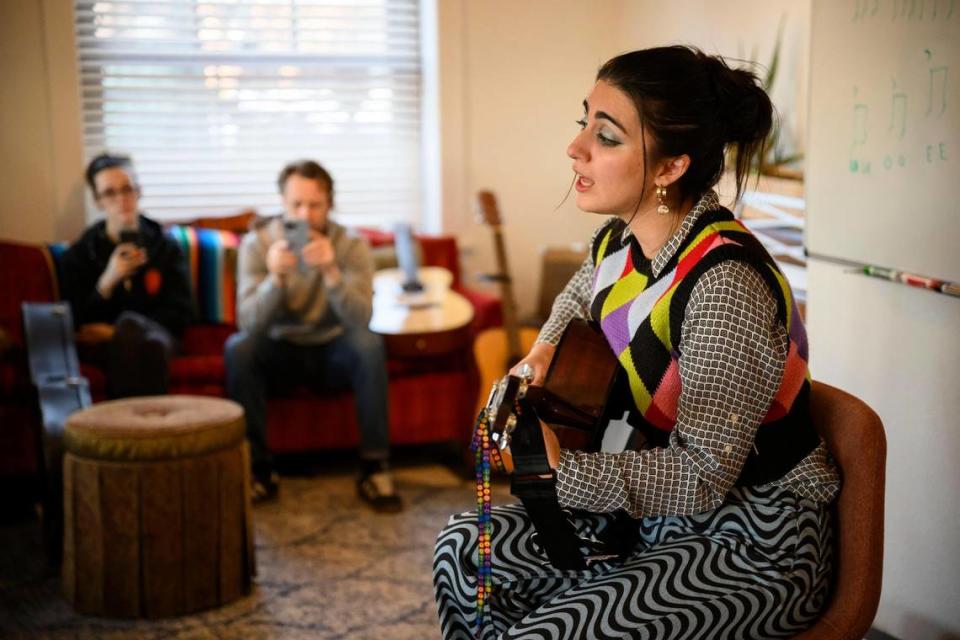 Overland Park native Kate Cosentino, who is competing on NBC’s “The Voice,” sings for students at the Rebel Song Academy, where she took songwriting classes when she was in high school.