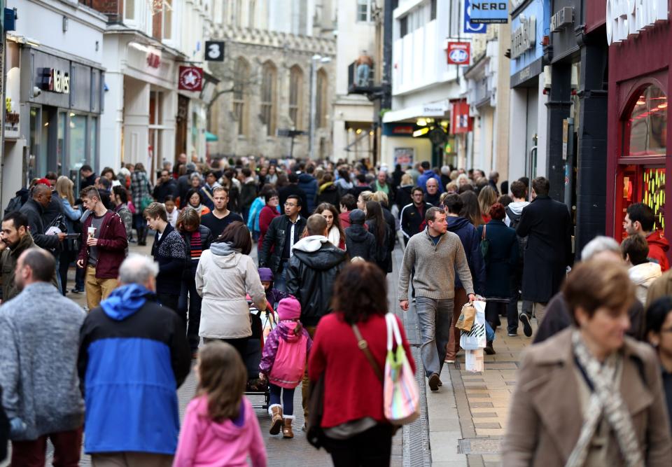 Shoppers make their way through the centre of Cambridge. Photo: Chris Radburn/PA Wire