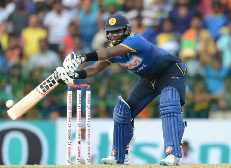 Sri Lanka's captain Angelo Mathews plays a shot during the second one-day International cricket match between Sri Lanka and Australia at The R Premadasa International Cricket Stadium in Colombo on August 24, 2016