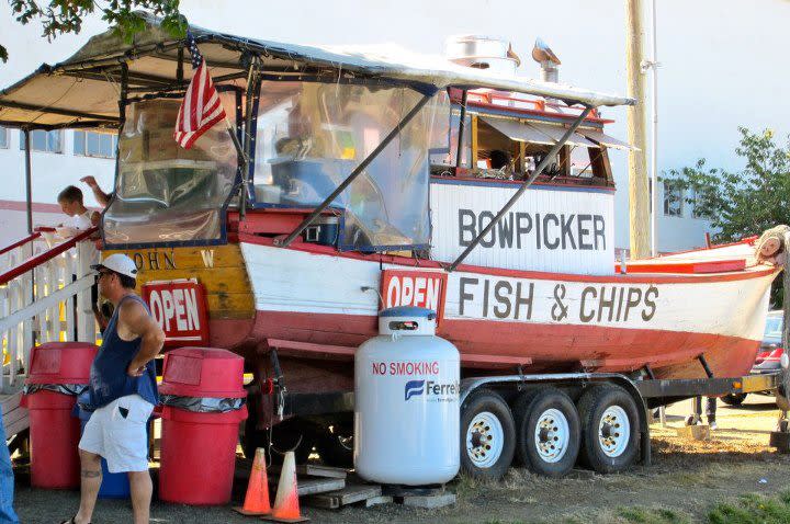 <p><b>Astoria, Oregon</b></p> <p>What better place to get fish-and-chips than a fishing boat? Even if it's high and dry on a boat across from the Columbia River Maritime Museum. You climb a set of stairs alongside the boat, order from the cabin (your choice of three or five perfectly fried pieces of beer-battered albacore tuna on steak fries), pay (cash only), and fish out a can of soda or bottle of water from a cooler; 503-791-2942, <a rel="nofollow noopener" href="http://www.bowpicker.com" target="_blank" data-ylk="slk:bowpicker.com;elm:context_link;itc:0;sec:content-canvas" class="link ">bowpicker.com</a></p>  