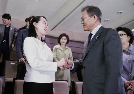 South Korean President Moon Jae-in talks with Kim Yo Jong, the sister of North Korea's leader Kim Jong Un, after watching North Korea's Samjiyon Orchestra's performance in Seoul, South Korea, February 11, 2018. Yonhap via REUTERS