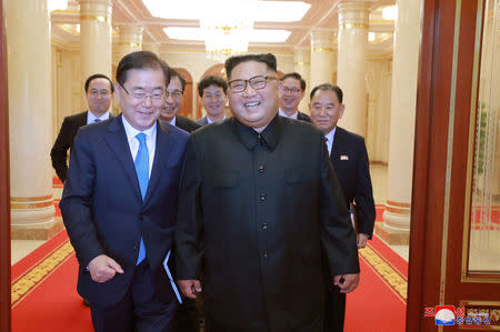 A South Korean envoy walks with North Korean leader Kim Jong Un during their meeting in Pyongyang, North Korea, in this undated photo released on September 6, 2018 by North Korea's Korean Central News Agency (KCNA). KCNA/via REUTERS