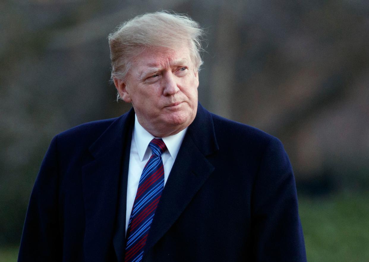 President Donald Trump arrives on Marine One on the South Lawn of the White House in Washington.