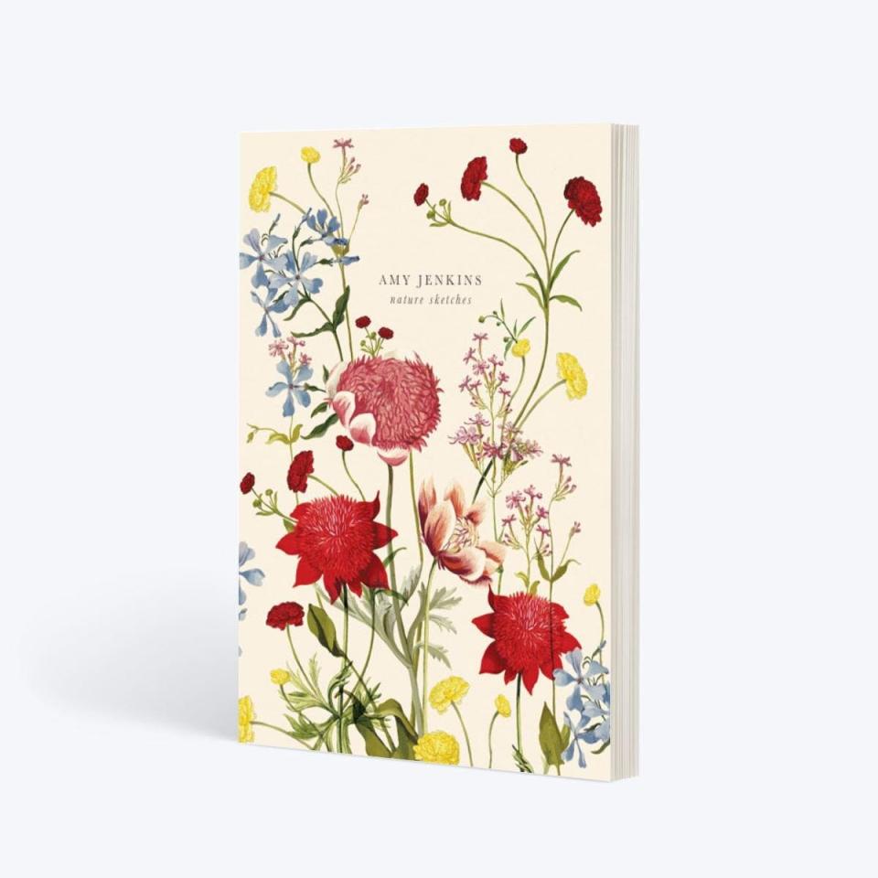 notebook with floral motif on cover