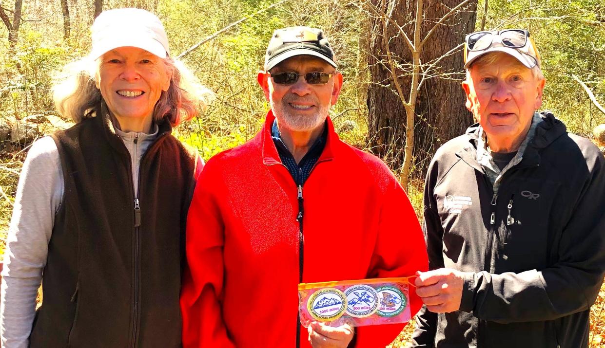 Ken Cohen, center, of Brockton completed his 2,000-mile hiking badge with the Southeastern Massachusetts chapter of the Appalachian Mountain Club on April 25, 2024. Susan Rollins, left, of Westport led the 5-mile Dartmouth hike; co-leader Walt Granda is on the right.
