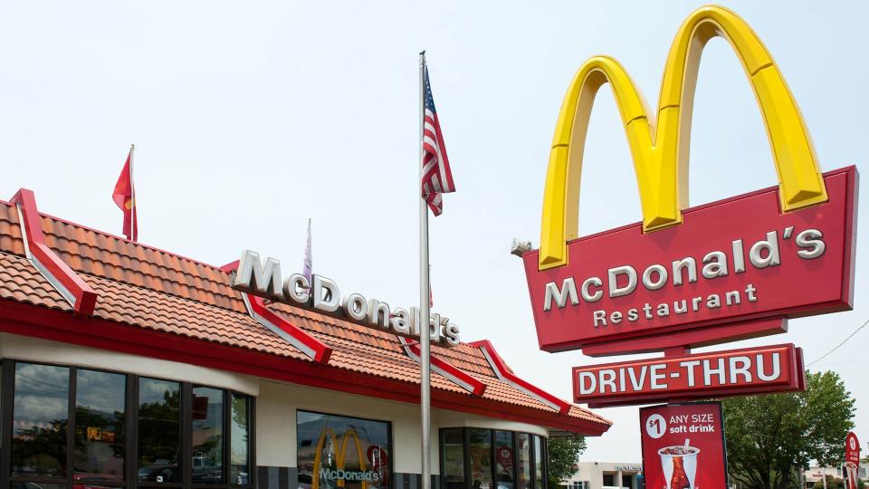 Albuquerque, New Mexico, USA - July 2, 2011: Traditional-looking McDonald's fast food restaurant with the characteristic company logo pole sign.