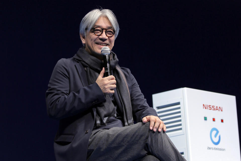 FILE - Japanese composer Ryuichi Sakamoto, speaks at the 'Nissan Leaf The New Owner's Meeting' in Tokyo on March 18 2012. Japan's recording company Avex says Sakamoto, a musician who scored for Hollywood movies such as “The Last Emperor” and “The Revenant,” has died. He was 71. He died March 28, according to the statement released Sunday, April 2, 2023. (AP Photo/Itsuo Inouye, File)