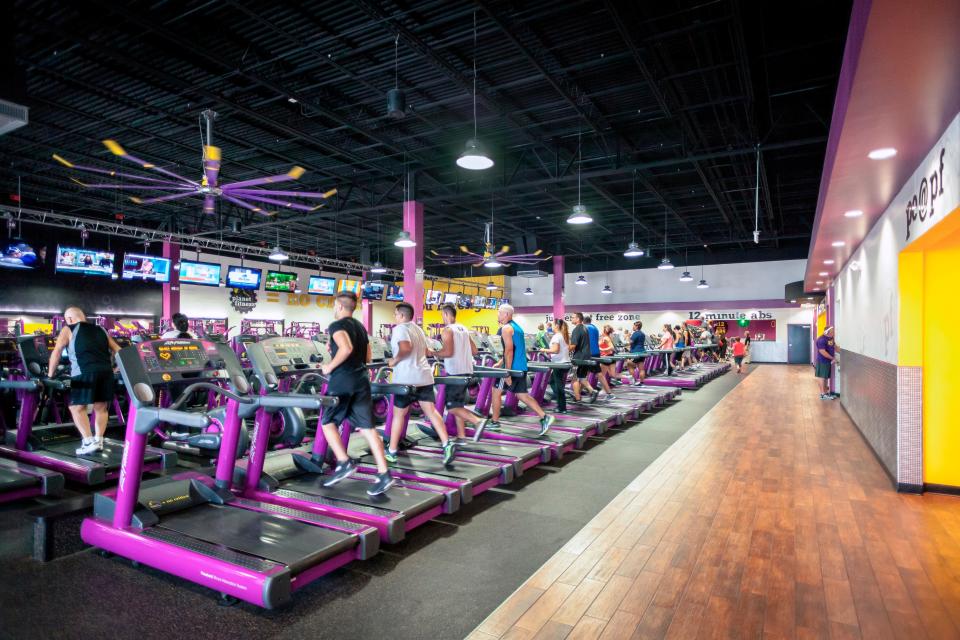 The interior of a Planet Fitness gym.
