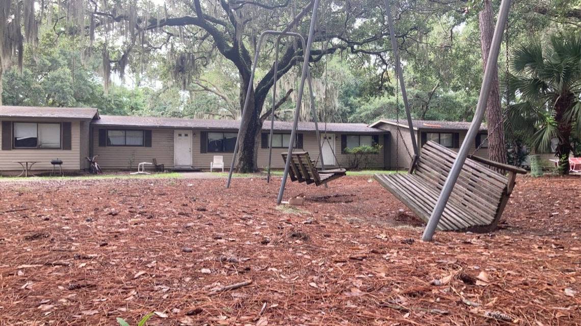 A suspended swing lies halfway on the ground at Chimney Cove. The neighborhood’s roughly 300 tenants, mostly Hispanic islanders, were surprised to find eviction notices on their doors on Aug. 12. Blake Douglas