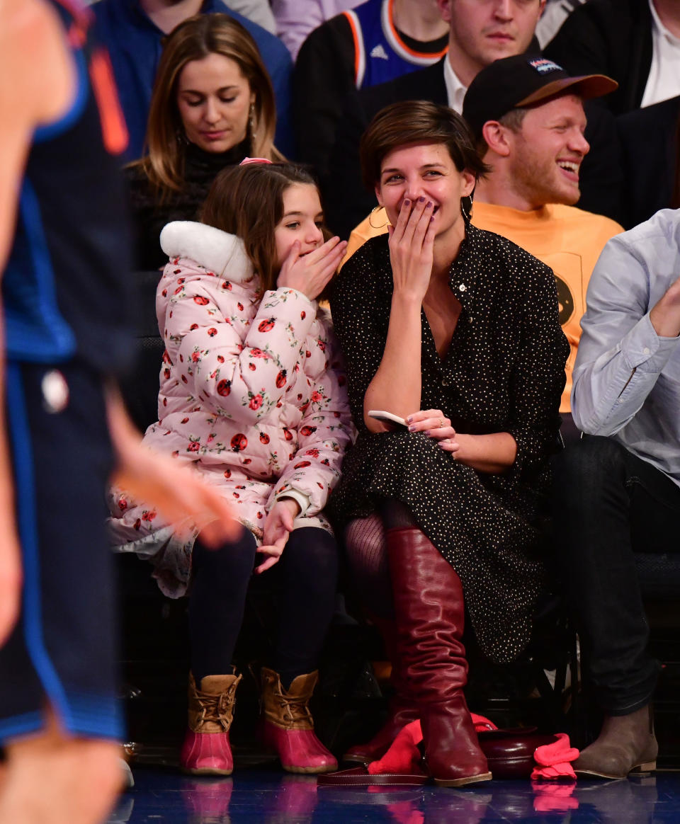 Katie Holmes and daughter Suri Cruise spend some quality family time watching the Knicks in New York City