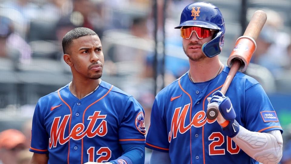 Jul 20, 2023; New York City, New York, USA; New York Mets shortstop Francisco Lindor (12) and first baseman Pete Alonso (20) walk off the field during a Chicago White Sox pitching change during the eighth inning at Citi Field.