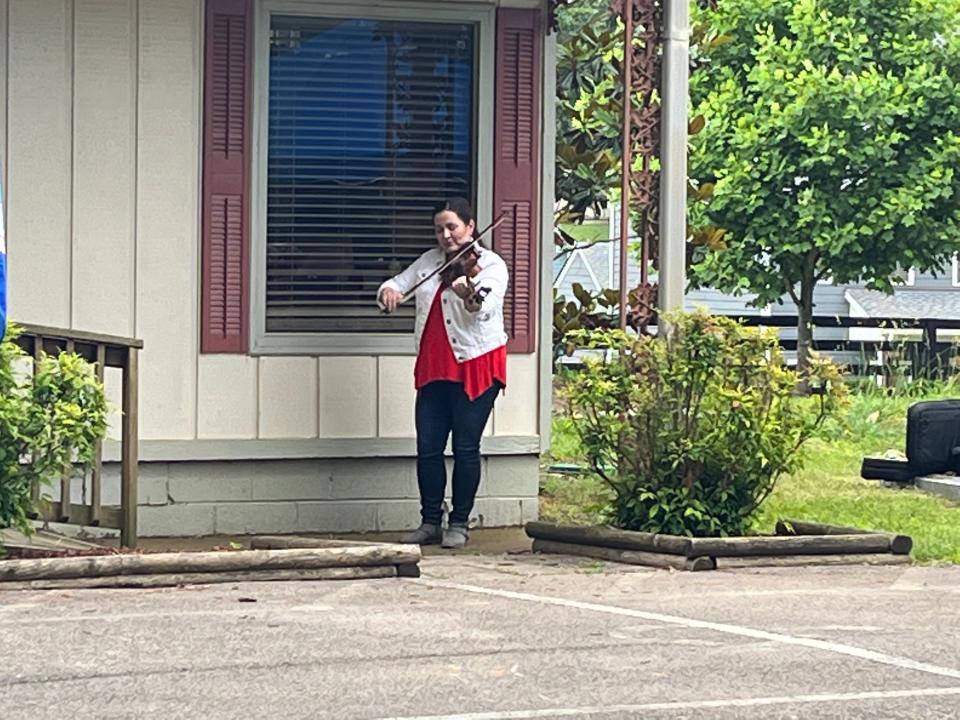 Acclaimed violinist DeMetri Moon performed "God Bless America" and other patriotic songs at the Memorial Day ceremony at Pinecrest Memorial Gardens in Columbia, Tenn. on Monday, May 29, 2023.